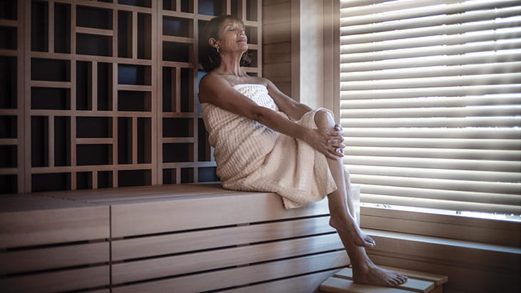 A woman in the sauna on Spirit of Adventure